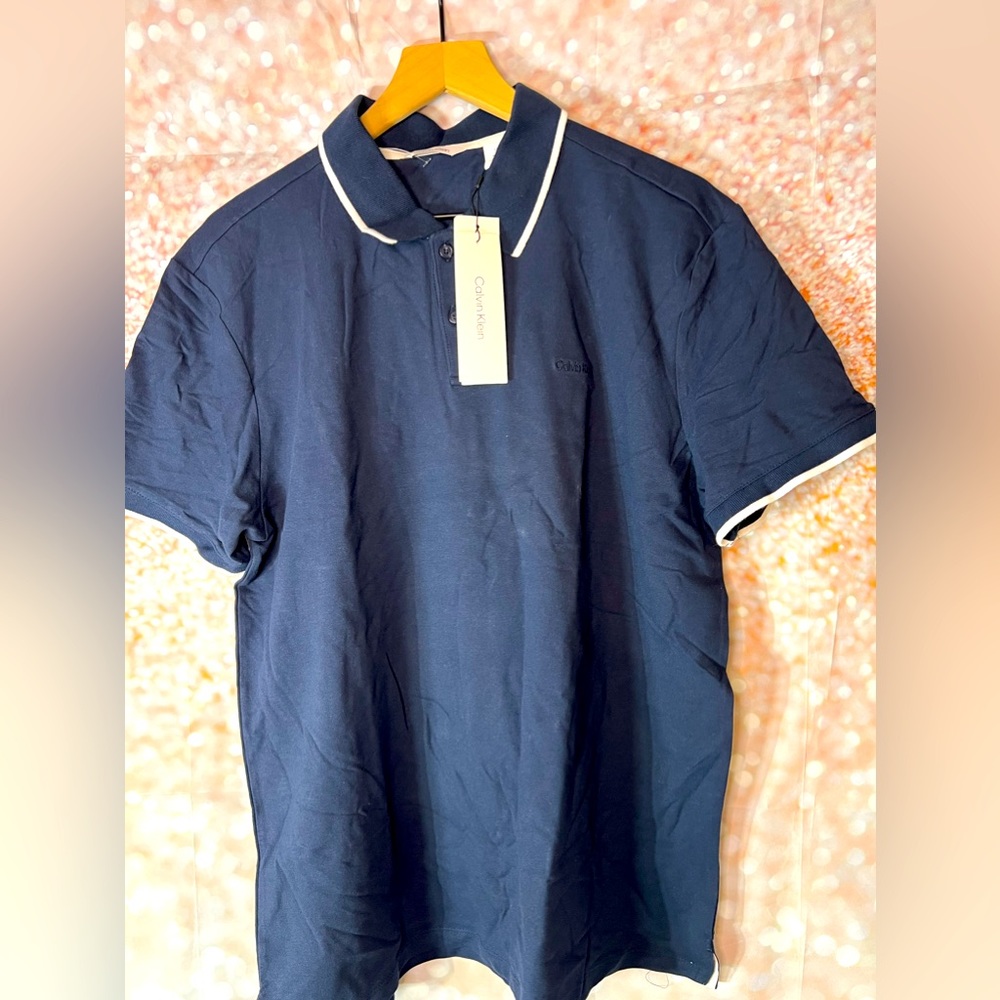 Calvin Klein navy polo mens size large.